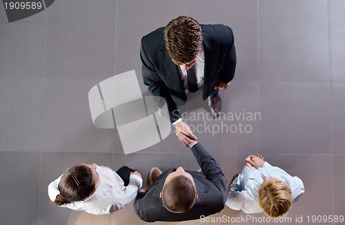 Image of business people making deal