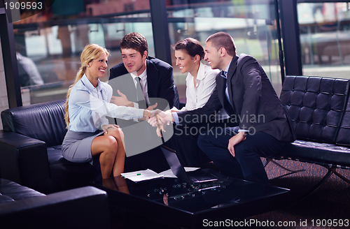 Image of business people in a meeting at office