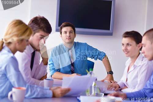 Image of business people in a meeting at office