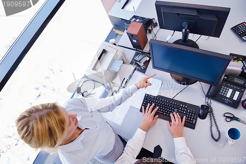 Image of business people in a meeting at office