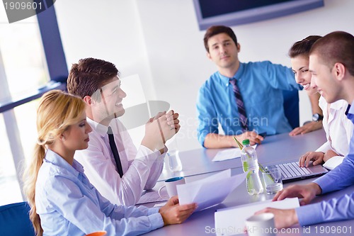 Image of business people in a meeting at office