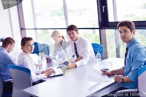 Image of business people in a meeting at office