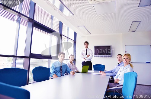 Image of business people in a meeting at office