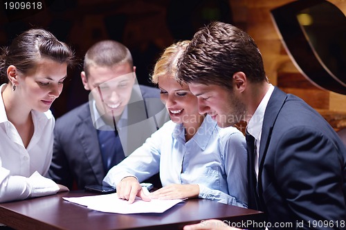 Image of business people in a meeting at office