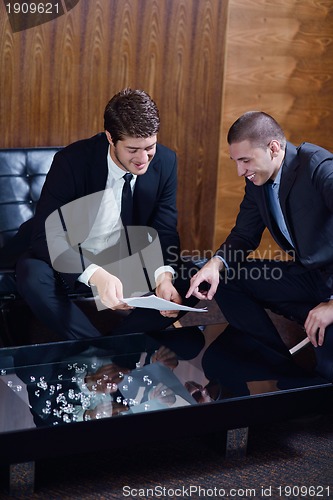 Image of business people making deal