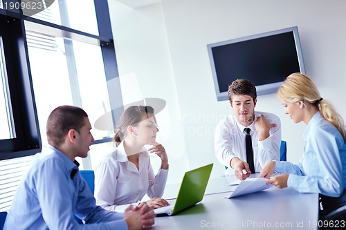 Image of business people in a meeting at office