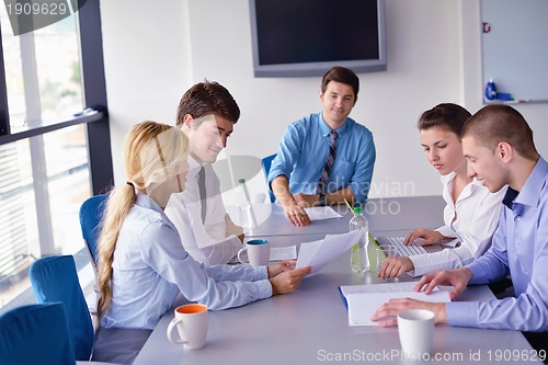 Image of business people in a meeting at office