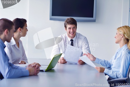 Image of business people in a meeting at office