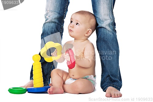 Image of Baby play on white background with mother