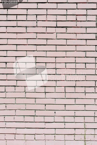 Image of pink painted brick wall