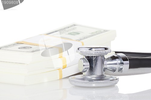 Image of stethoscope and dollars