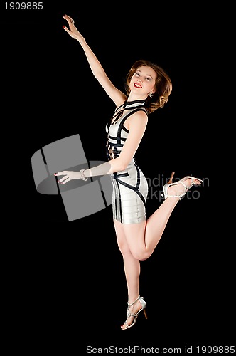 Image of young attractive woman jumping...