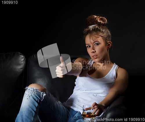 Image of Portrait of a woman with a glass of alcohol