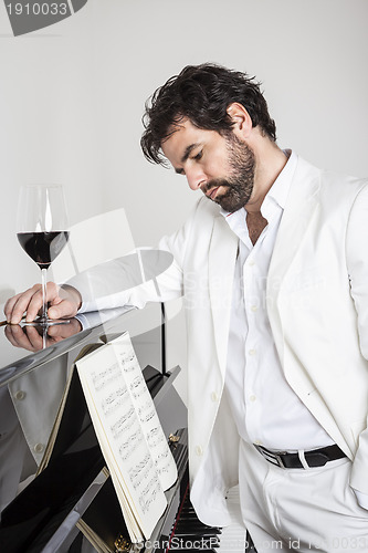 Image of man and piano