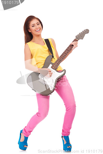 Image of woman punk rock star playing 