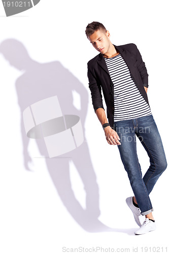 Image of young fashion man in shirt, coat and jeans