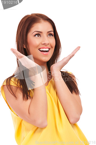 Image of side of an excited young casual woman