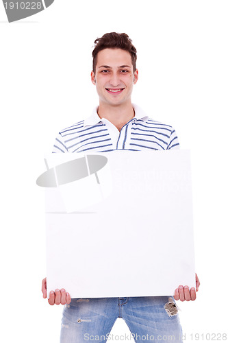 Image of casual man holding white sign to write it on your text