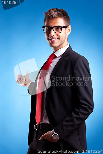 Image of Happy business man giving presentation 