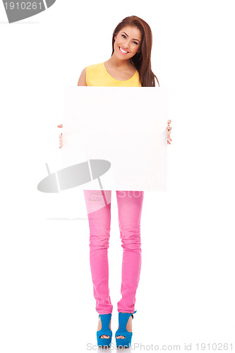 Image of  smiling young woman with blank bill board