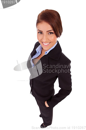 Image of  business woman with her hands in  pockets