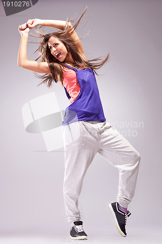 Image of modern style dancer posing and screaming