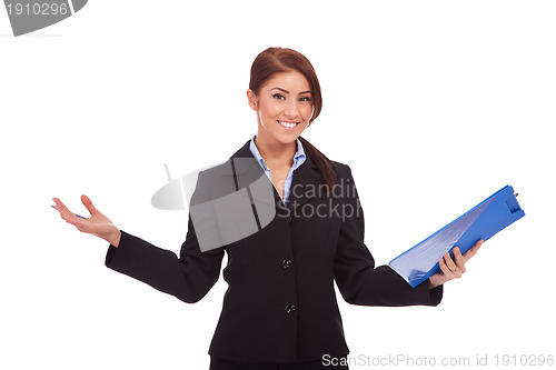 Image of business woman holding a  clipboard and welcoming