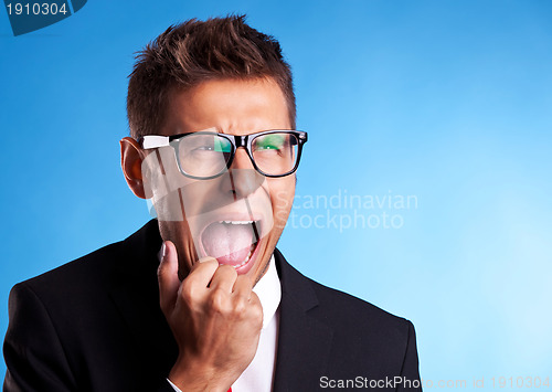 Image of Angry businessman shouting 