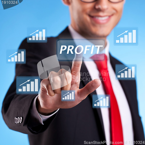 Image of business man hand pressing profit button 