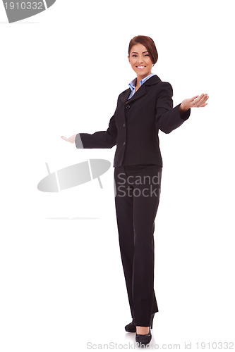 Image of smiling business woman welcoming
