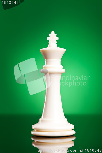 Image of white king on green background