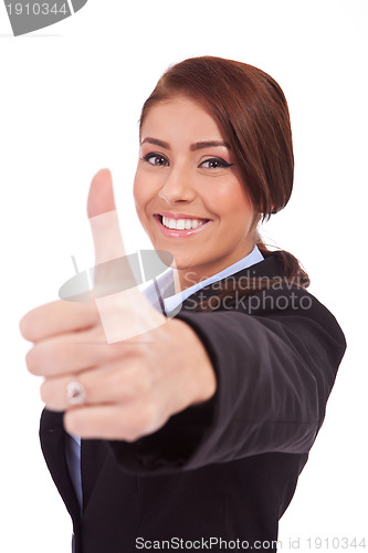 Image of  business woman making thumb up ok gesture