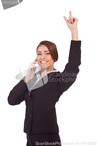 Image of business woman winning on the phone