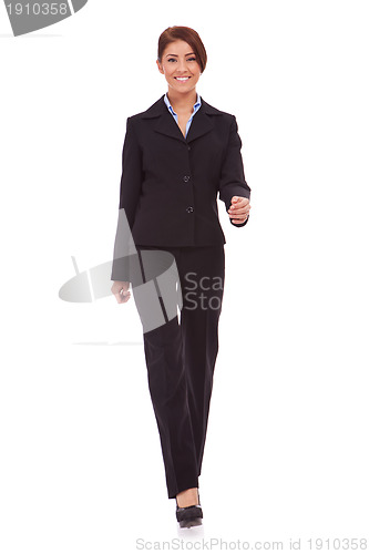 Image of Business woman walking