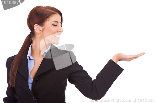Image of Business woman presenting something