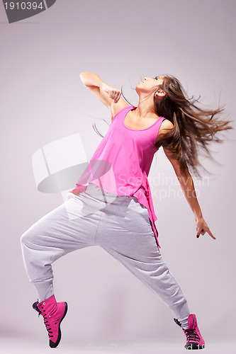 Image of Young woman dancer posing