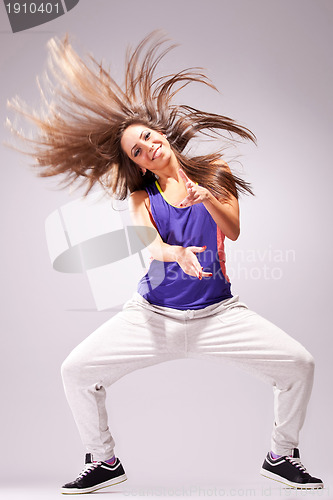 Image of headbanging woman dancer