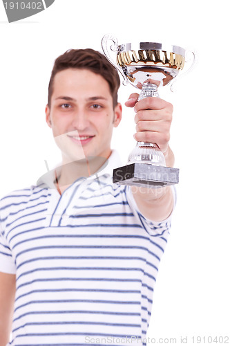 Image of young man winning the first place trophy