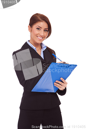 Image of smiling business woman with blue clipboard