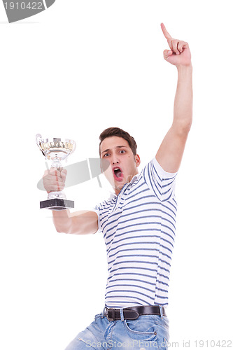 Image of young casual man winning a trophy