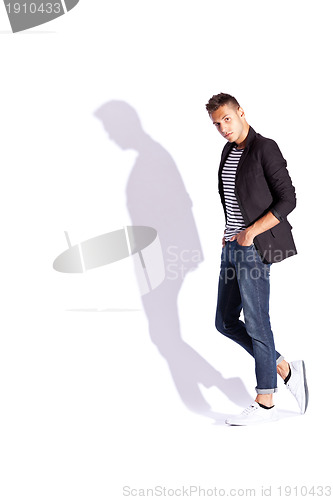 Image of young fashion male model posing