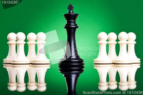 Image of black king in front of white pawns