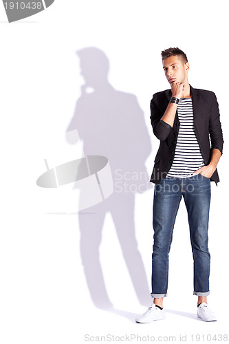 Image of young fashion  man posing