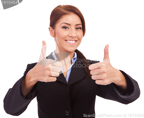 Image of  business woman with thumbs up gesture