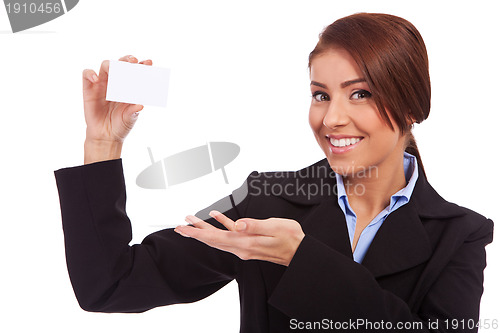 Image of businesswoman showing blank business card
