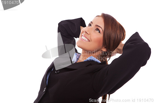 Image of side view of a relaxed business woman