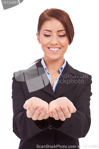 Image of business woman holding something