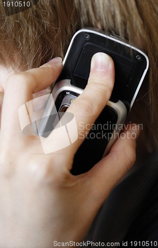 Image of Woman speaking on cellphone