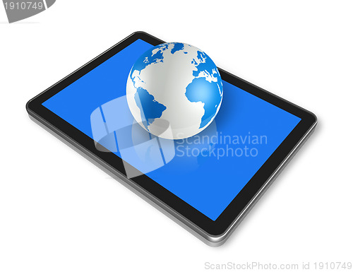 Image of digital tablet pc and world globe