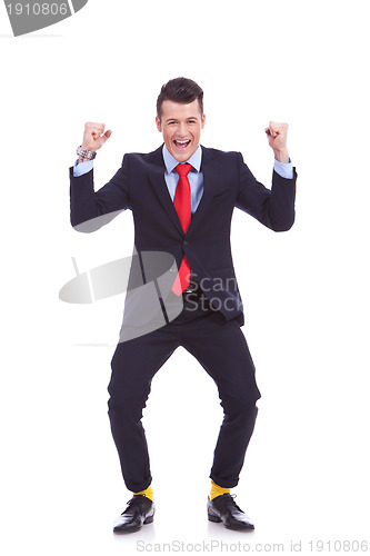 Image of funny looking business man winning